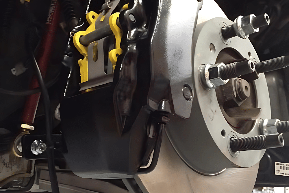 Car Accessories, Car Accessories, Auto Repair in Gainesville, GA at Atlanta Speedwerks. Image of a vehicle’s upgraded brake system, featuring precision-installed rotors and calipers.