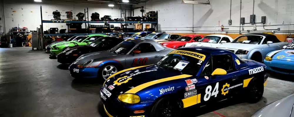 a group of cars in a garage