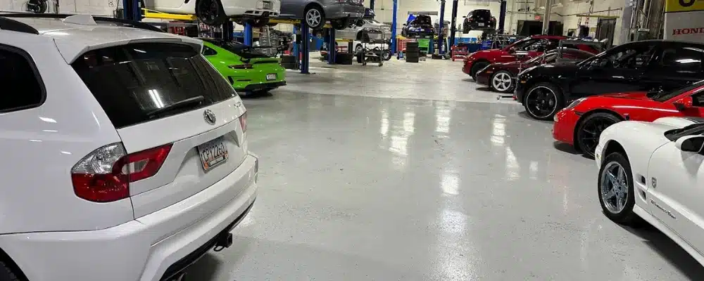 a group of cars in a garage