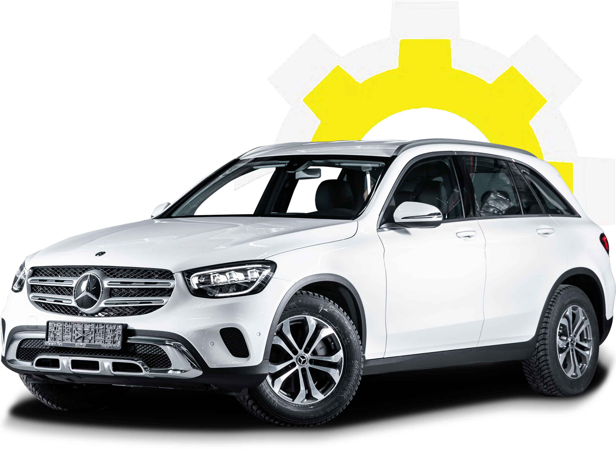 European auto repair shop specialists in Gainsville, GA. with Atlanta Speedwerks. White Mercedes-Benz SUV parked in front of a stylized yellow and white gear icon
