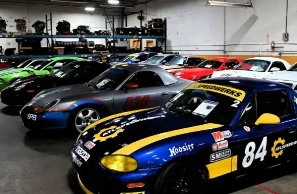 a group of cars in a garage