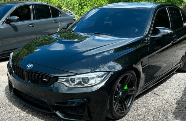 BMW, MINI, and EV maintenance, auto repair in Gainesville, GA by Atlanta Speedwerks. Image of a black BMW sedan parked outdoors, showcasing performance upgrades and precision European auto care.