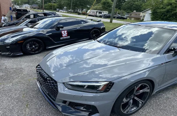 Audi A/C Repair in Gainesville, GA by Atlanta Speedwerks. Image showcasing a lineup of high-performance vehicles, including an Audi, highlighting the expertise of Atlanta Speedwerks in diagnosing and repairing air conditioning issues in Audi vehicles, ensuring cool and comfortable rides during hot weather.