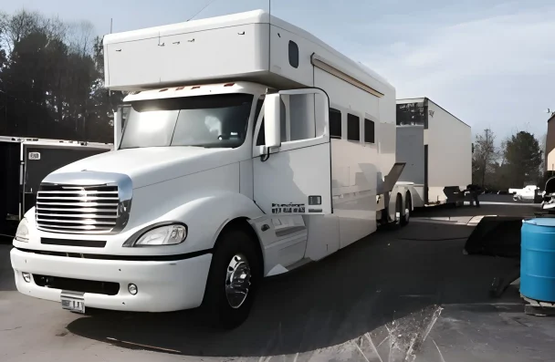 a white truck with a trailer