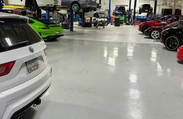 a group of cars in a garage