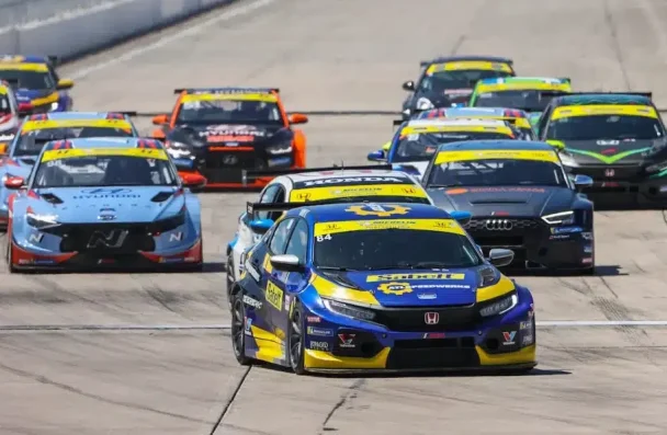 a group of race cars on a track