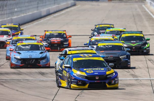 a group of race cars on a track