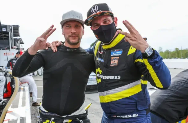 two men posing for a picture